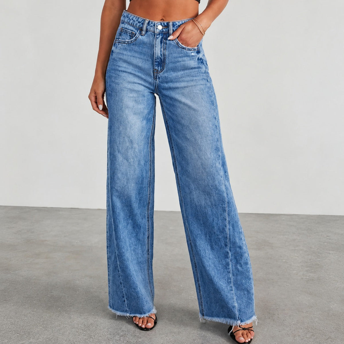 Women's Wide Jeans with High Waist and Destroyed Hem - Relaxed Fit