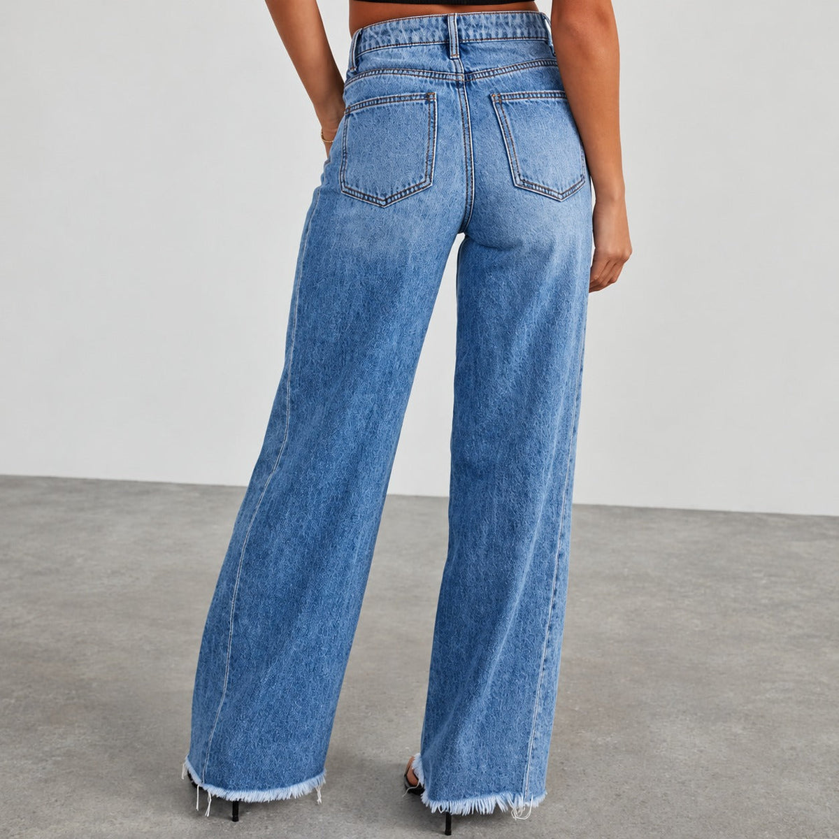 Women's Wide Jeans with High Waist and Destroyed Hem - Relaxed Fit