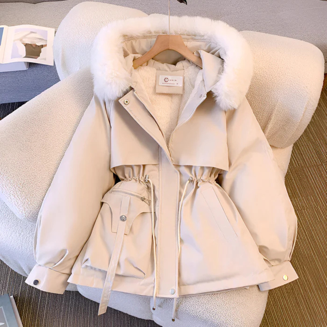 Women's winter jacket with hood, tailored fit, zippered pockets, and elegant silhouette