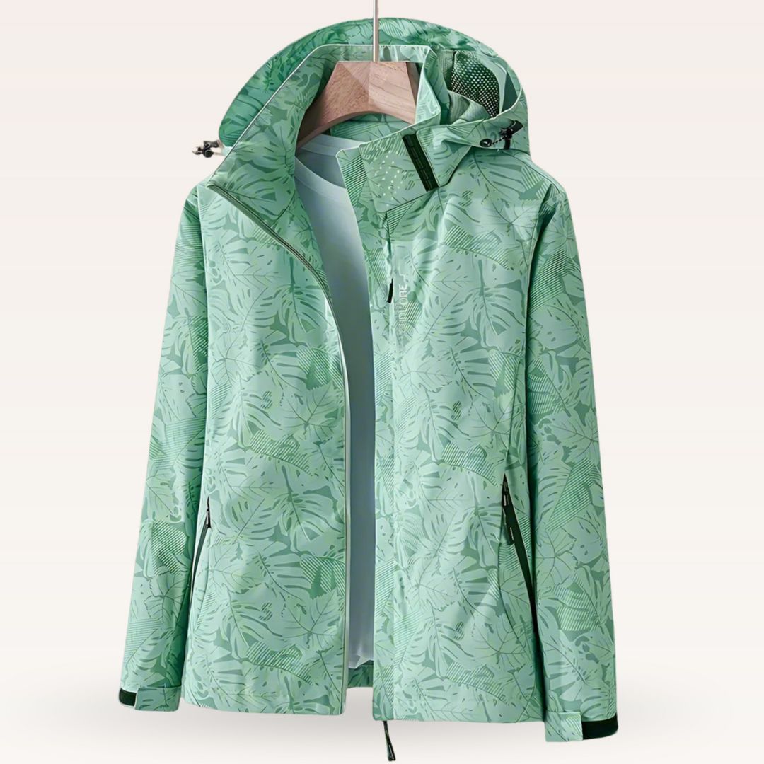 Lightweight waterproof jacket for women with adjustable hood and leaf pattern