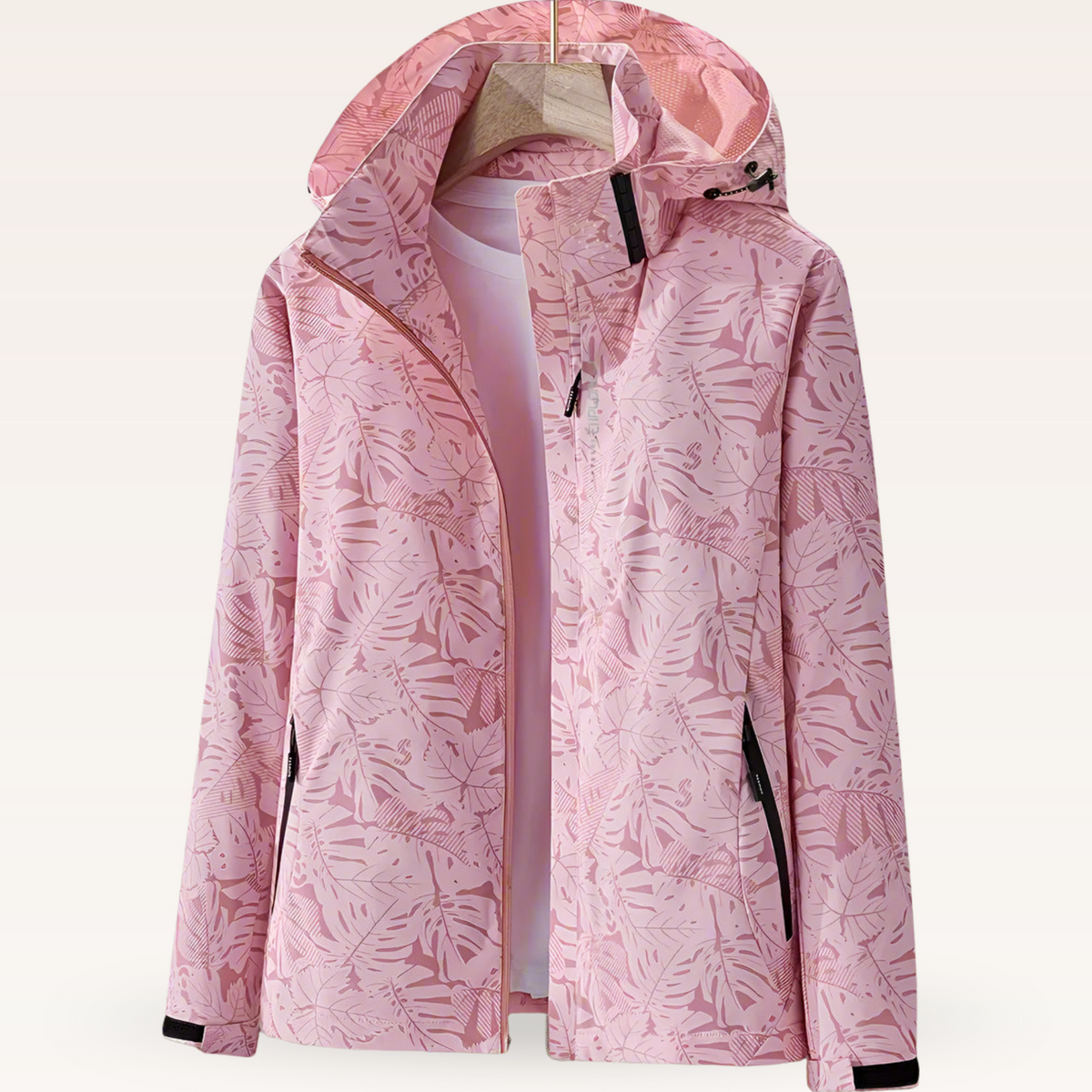 Lightweight waterproof jacket for women with adjustable hood and leaf pattern
