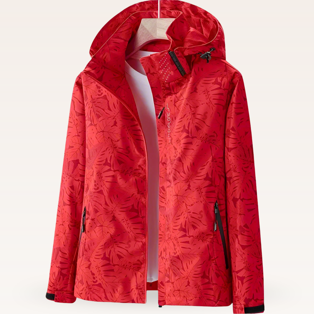 Lightweight waterproof jacket for women with adjustable hood and leaf pattern