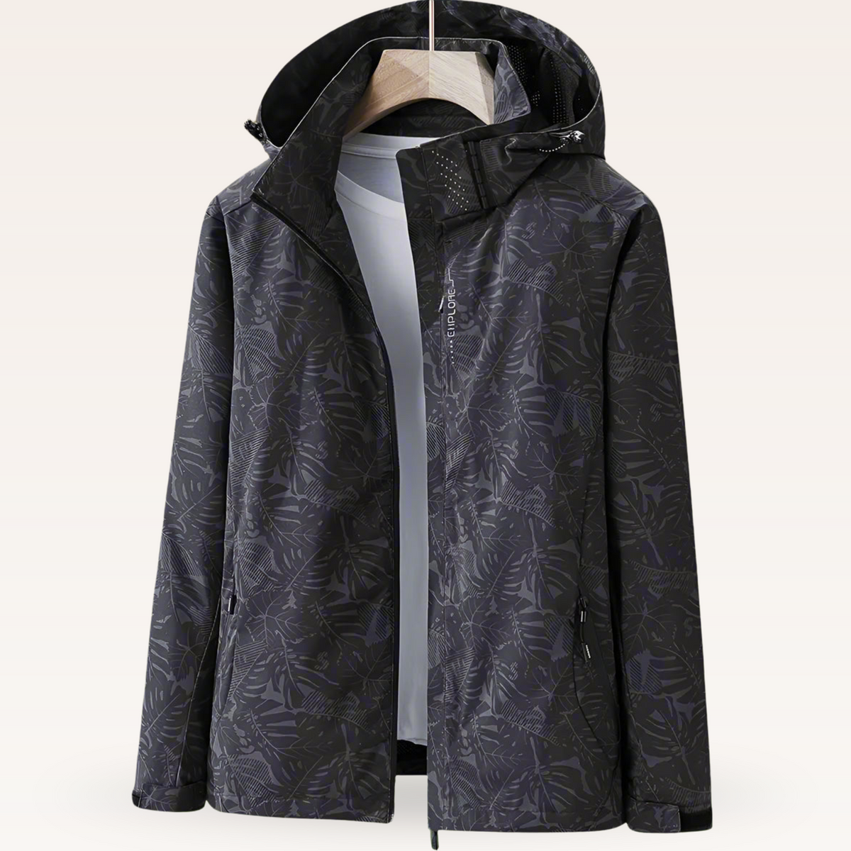 Lightweight waterproof jacket for women with adjustable hood and leaf pattern